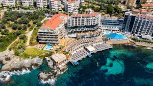 Charisma De Luxe Hotel car rental