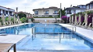 Kamer Suits Hotel car rental